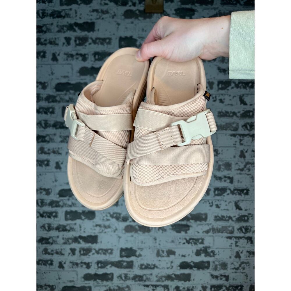 TEVA light pink/salmon colored slides.